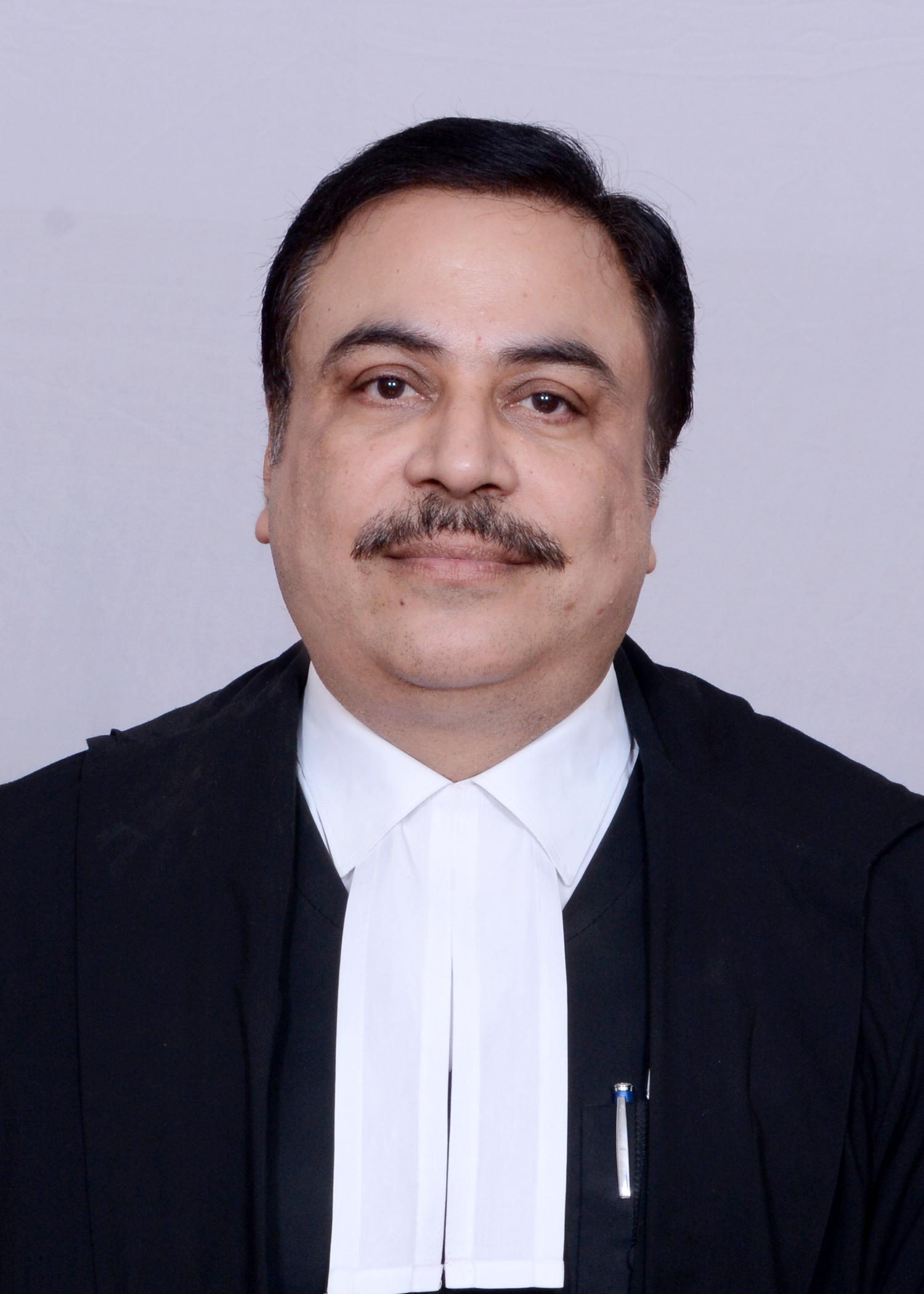 Hon’ble Mr. Justice Mahesh Chandra Tripathi 
