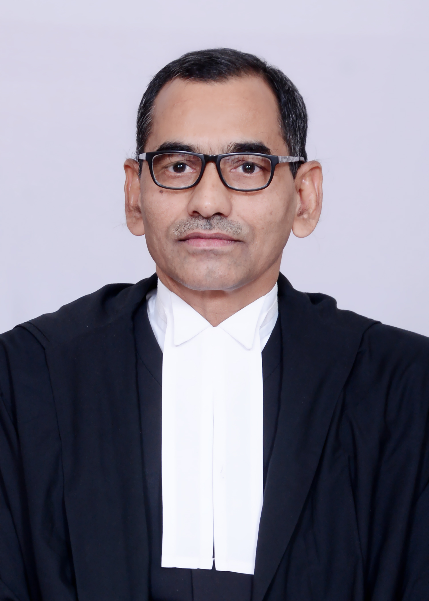Hon’ble Mr. Justice Om Prakash-VII 